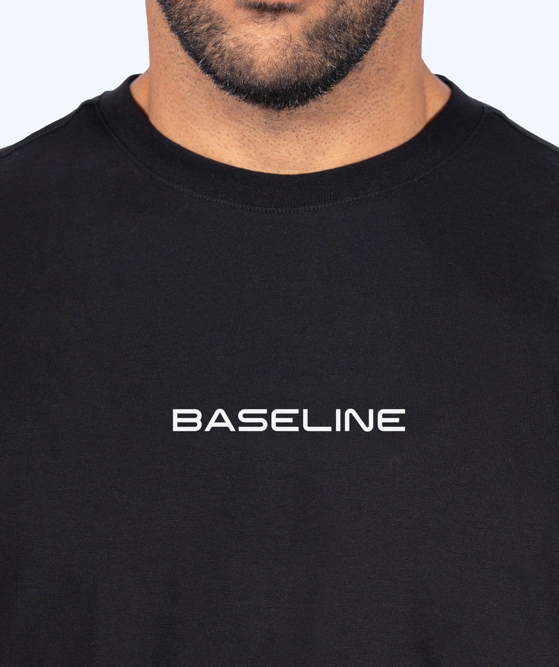 Black 'Icon Oversized' t-shirt with 'BASELINE' text on a plain background